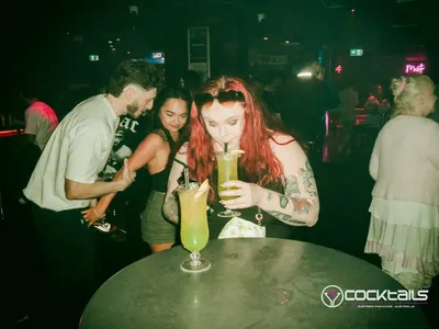 A professional photo of guests enjoying themselves at Cocktails Nightclub from our gallery.