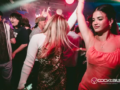 A professional photo of guests enjoying themselves at Cocktails Nightclub from our gallery.