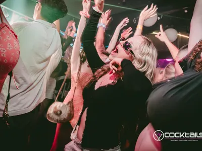 A professional photo of guests enjoying themselves at Cocktails Nightclub from our gallery.