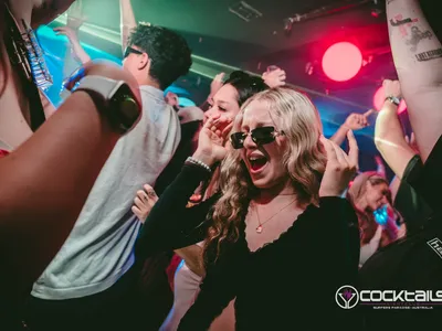 A professional photo of guests enjoying themselves at Cocktails Nightclub from our gallery.