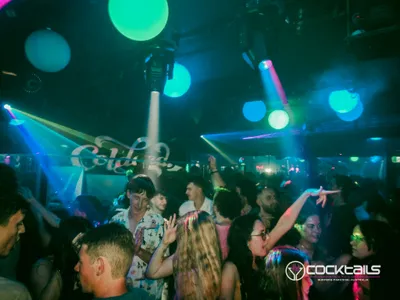 A professional photo of guests enjoying themselves at Cocktails Nightclub from our gallery.