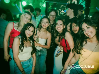 A professional photo of guests enjoying themselves at Cocktails Nightclub from our gallery.