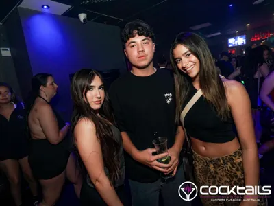 A professional photo of guests enjoying themselves at Cocktails Nightclub from our gallery.