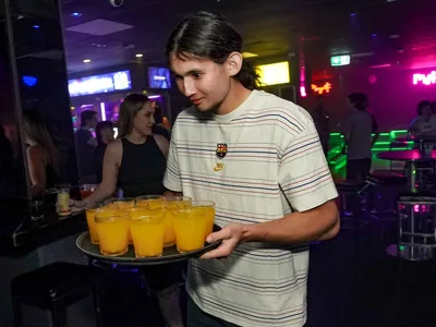 A professional photo of guests enjoying themselves at Cocktails Nightclub from our gallery.