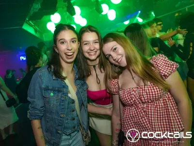 A professional photo of guests enjoying themselves at Cocktails Nightclub from our gallery.