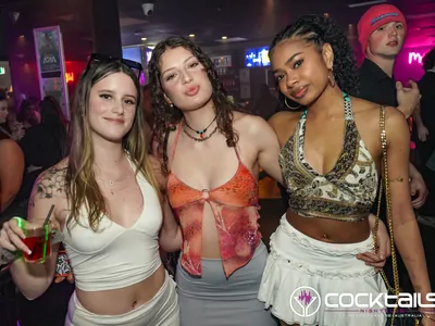 A professional photo of guests enjoying themselves at Cocktails Nightclub from our gallery.