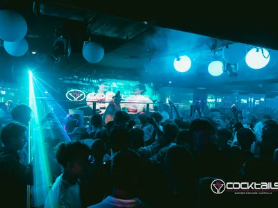 A professional photo of guests enjoying themselves at Cocktails Nightclub from our gallery.