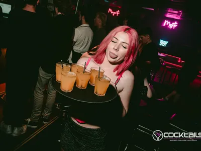 A professional photo of guests enjoying themselves at Cocktails Nightclub from our gallery.