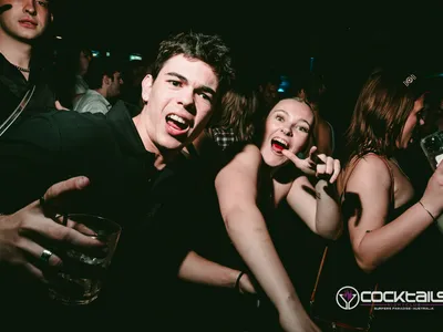 A professional photo of guests enjoying themselves at Cocktails Nightclub from our gallery.