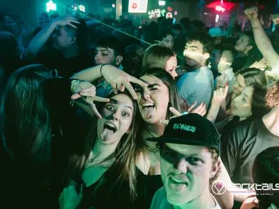 A professional photo of guests enjoying themselves at Cocktails Nightclub from our gallery.