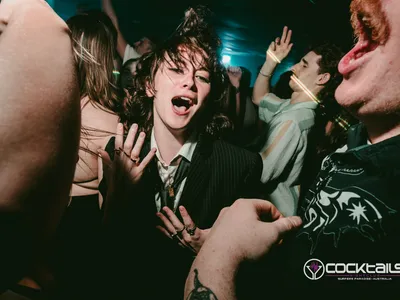 A professional photo of guests enjoying themselves at Cocktails Nightclub from our gallery.