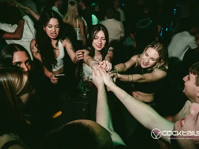 A professional photo of guests enjoying themselves at Cocktails Nightclub from our gallery.