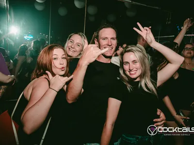 A professional photo of guests enjoying themselves at Cocktails Nightclub from our gallery.