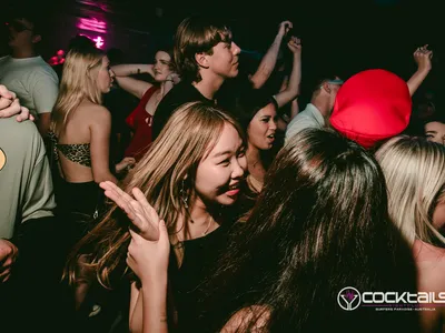 A professional photo of guests enjoying themselves at Cocktails Nightclub from our gallery.