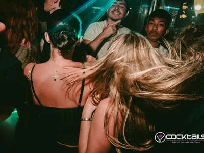 A professional photo of guests enjoying themselves at Cocktails Nightclub from our gallery.