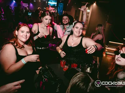 A professional photo of guests enjoying themselves at Cocktails Nightclub from our gallery.