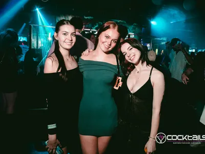 A professional photo of guests enjoying themselves at Cocktails Nightclub from our gallery.