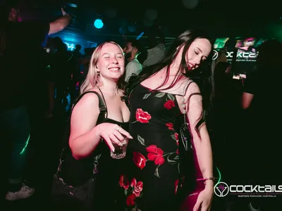 A professional photo of guests enjoying themselves at Cocktails Nightclub from our gallery.