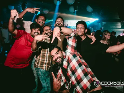 A professional photo of guests enjoying themselves at Cocktails Nightclub from our gallery.