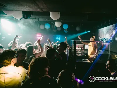 A professional photo of guests enjoying themselves at Cocktails Nightclub from our gallery.