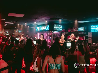 A professional photo of guests enjoying themselves at Cocktails Nightclub from our gallery.