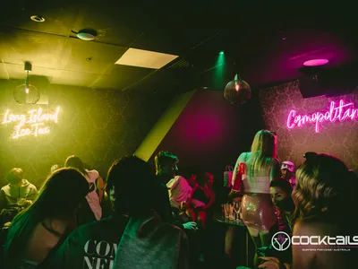 A professional photo of guests enjoying themselves at Cocktails Nightclub from our gallery.