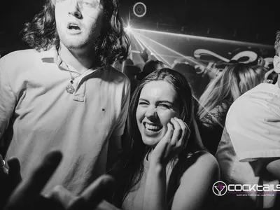 A professional photo of guests enjoying themselves at Cocktails Nightclub from our gallery.