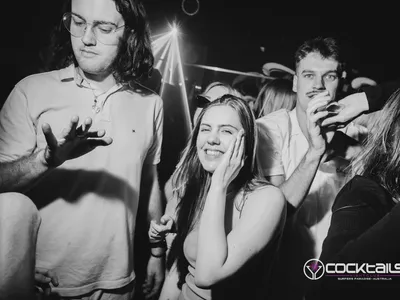 A professional photo of guests enjoying themselves at Cocktails Nightclub from our gallery.