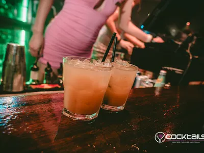 A professional photo of guests enjoying themselves at Cocktails Nightclub from our gallery.