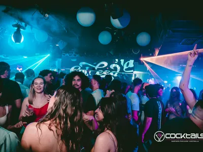 A professional photo of guests enjoying themselves at Cocktails Nightclub from our gallery.