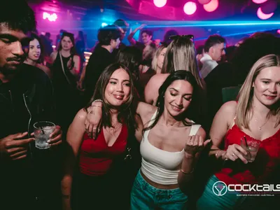 A professional photo of guests enjoying themselves at Cocktails Nightclub from our gallery.