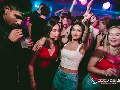 A professional photo of guests enjoying themselves at Cocktails Nightclub from our gallery.