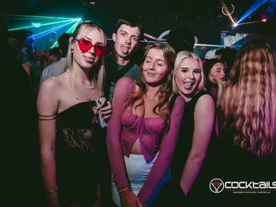 A professional photo of guests enjoying themselves at Cocktails Nightclub from our gallery.