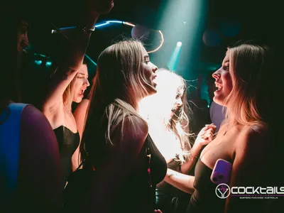 A professional photo of guests enjoying themselves at Cocktails Nightclub from our gallery.