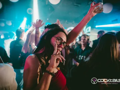 A professional photo of guests enjoying themselves at Cocktails Nightclub from our gallery.