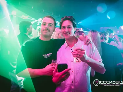 A professional photo of guests enjoying themselves at Cocktails Nightclub from our gallery.