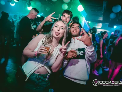 A professional photo of guests enjoying themselves at Cocktails Nightclub from our gallery.