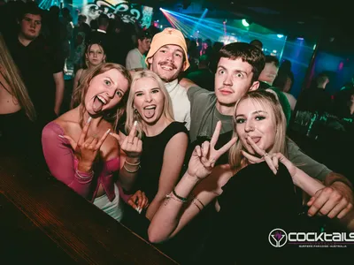 A professional photo of guests enjoying themselves at Cocktails Nightclub from our gallery.