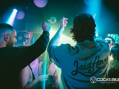 A professional photo of guests enjoying themselves at Cocktails Nightclub from our gallery.