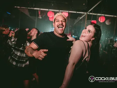 A professional photo of guests enjoying themselves at Cocktails Nightclub from our gallery.