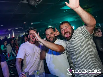 A professional photo of guests enjoying themselves at Cocktails Nightclub from our gallery.