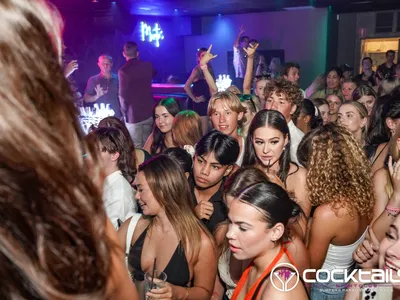 A professional photo of guests enjoying themselves at Cocktails Nightclub from our gallery.