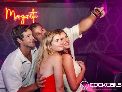 A professional photo of guests enjoying themselves at Cocktails Nightclub from our gallery.