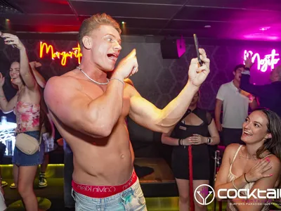 A professional photo of guests enjoying themselves at Cocktails Nightclub from our gallery.