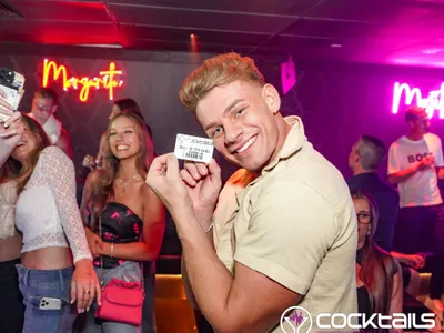 A professional photo of guests enjoying themselves at Cocktails Nightclub from our gallery.