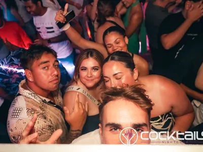 A professional photo of guests enjoying themselves at Cocktails Nightclub from our gallery.