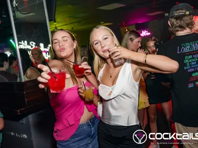 A professional photo of guests enjoying themselves at Cocktails Nightclub from our gallery.