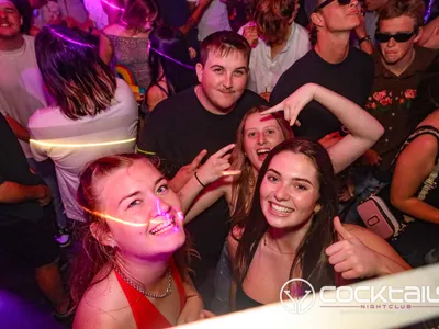 A professional photo of guests enjoying themselves at Cocktails Nightclub from our gallery.