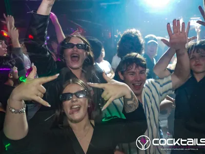 A professional photo of guests enjoying themselves at Cocktails Nightclub from our gallery.