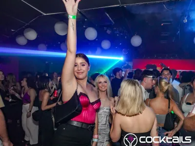 A professional photo of guests enjoying themselves at Cocktails Nightclub from our gallery.